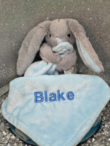 Bunny Baby Comforter holding blanket