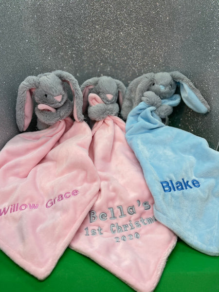 Bunny Baby Comforter holding blanket