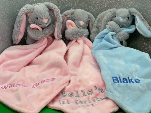 Bunny Baby Comforter holding blanket